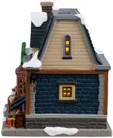 Lemax leo's leatherworks & repairs verlicht kersthuisje Vail Village 2025 - afbeelding 4